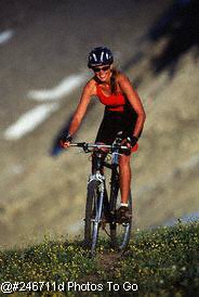 Young woman mountain biking
